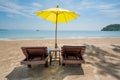 Beach Chairs and Umbrella on summer island in Phuket, Thailand. Royalty Free Stock Photo