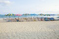 Beach chairs and umbrellas on beautiful sea side place Royalty Free Stock Photo