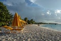 Beach chairs and umbrellas at sunset, Shoal Bay East, Anguilla, British West Indies, BWI, Caribbean Royalty Free Stock Photo