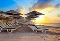 Beach chairs and umrellas at dawn Royalty Free Stock Photo