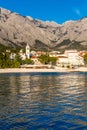 Beach,City,Church And Biokovo-Baska Voda,Croatia Royalty Free Stock Photo