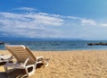 Beach, city and ocean view in Puerto Vallarta Mexico with beach chairs and coastline. Royalty Free Stock Photo