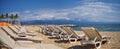 Beach, city and ocean view in Puerto Vallarta Mexico with beach chairs and coastline. Royalty Free Stock Photo