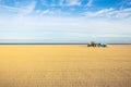 Beach cleaned by a tractor Royalty Free Stock Photo