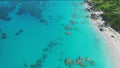 Beach and clear water of the Caribbean. Reefs and the ocean aerial view.