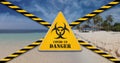 Beach closed due to Coronavirus. Caution tape and danger sign, restricted area lockdown Royalty Free Stock Photo