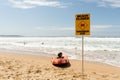 Beach closed sign and surf rescue boat at the beach in Sydney. Royalty Free Stock Photo