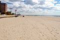 Beach at Coney Island with Parachute Jump in the Background, New York City Royalty Free Stock Photo