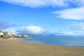 A beach of Costa del Sol before a tourist season, Mediterranean sea and a view to Torremolinos Royalty Free Stock Photo