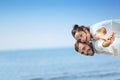 Beach couple laughing in love romance on travel honeymoon vacation Royalty Free Stock Photo