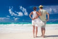 Beach couple walking on romantic travel honeymoon vacation summer holidays romance. Young happy lovers, Cayo LArgo, Cuba Royalty Free Stock Photo