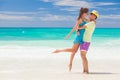 Beach couple walking on romantic travel honeymoon vacation summer holidays romance. Young happy lovers, Cayo LArgo, Cuba Royalty Free Stock Photo