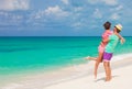 Beach couple walking on romantic travel honeymoon vacation summer holidays romance. Young happy lovers, Cayo LArgo, Cuba Royalty Free Stock Photo