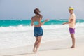 Beach couple walking on romantic travel honeymoon vacation summer holidays romance. Young happy lovers, Cayo LArgo, Cuba Royalty Free Stock Photo