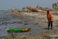 A beach covered by plastic litter in the Petite CÃÂ´te of Senegal, Western Africa Royalty Free Stock Photo