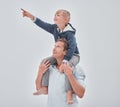 Beach, dad and child on shoulders pointing, family holiday ocean walk in Australia. Travel, fun and happy father and son Royalty Free Stock Photo