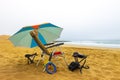 Beach Decathlon umbrella, Quechua chairs, a freesbe and a JBL Flip 4 Hight speaker