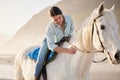 Beach, equestrian and woman riding her horse outdoor on a summer morning for training or practice. Nature, sunset and a Royalty Free Stock Photo