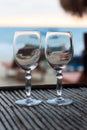 Beach evening on the sunset with two glasses Royalty Free Stock Photo