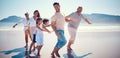 Beach, family playing and running together on holiday, generations walking on ocean sand. Fun, vacation and happy men Royalty Free Stock Photo