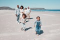 Beach, family and portrait of kids running in sand, playful and having fun while bonding outdoors. Face, children and Royalty Free Stock Photo