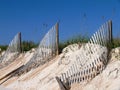 Beach fences and sand dunes Royalty Free Stock Photo