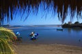 Beach of a fishing village, Low tide at sunset. Royalty Free Stock Photo