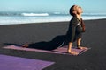 Beach. Fitness Girl Stretching On Yoga Mat. Sporty Woman With Perfect Body In Fashion Sportswear Workout Outdoor. Royalty Free Stock Photo