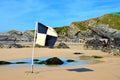 Beach flags, Lusty Glaze beach, Newquay in Cornwall