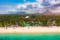 Beach of Flic en Flac with beautiful peaks in the background, Mauritius. Beautiful Mauritius Island with gorgeous beach Flic en Royalty Free Stock Photo