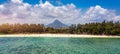 Beach of Flic en Flac with beautiful peaks in the background, Mauritius. Beautiful Mauritius Island with gorgeous beach Flic en Royalty Free Stock Photo