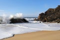 Beach with foaming waves Royalty Free Stock Photo