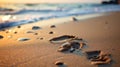 A beach with footprints in the sand and waves crashing on shore, AI Royalty Free Stock Photo