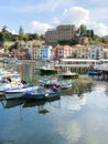 Beach front homes with small boats moored in the water in Sorrento on the Amalfi Coast Royalty Free Stock Photo