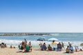 Beach-front with people sunbathing Fuengirola Spain