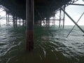 waves incoming green ocean salt water close up under pier side part 2 Royalty Free Stock Photo