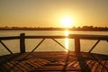 Beach gazebo and sunset over the lake Royalty Free Stock Photo