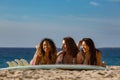 Beach girls having fun with surfboard Royalty Free Stock Photo