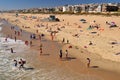 Beach goers enjoy the summer sun along the coast