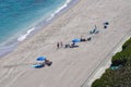 Beach goers sunbathing at Riviera Beach, Florida Royalty Free Stock Photo