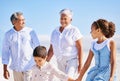 Beach, grandparents or happy kids holding hands, walking or smiling in summer as a family in nature. Grandmother, senior Royalty Free Stock Photo