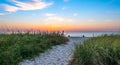 Beach and grass dunes at sunrise. Royalty Free Stock Photo