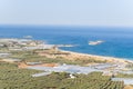 The rocky coast and its arid cliffs , in Europe, Greece, Crete, Agios Pavlos, By the Mediterranean Sea, in summer, on a sunny day