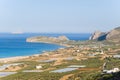 The beach by the greenhouses and olive trees in the countryside , in Europe, in Greece, in Crete, towards Kissamos, towards Chania Royalty Free Stock Photo