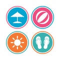 Beach holidays icons. Umbrella and sandals. Royalty Free Stock Photo