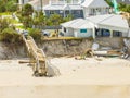 Beach homes collapse aftermath Hurricane Nicole Daytona Florida