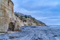 Beach homes on mountain along shore with tire tracks in San Diego California Royalty Free Stock Photo