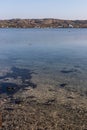 Beach, houses, Vegetation and rocks around Clifden bay Royalty Free Stock Photo