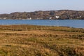 Beach houses, Vegetation and rocks around Clifden bay Royalty Free Stock Photo