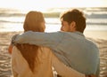 Beach hug, sunset and couple relax with summer sunshine, wellness and bonding on travel holiday in Greece. Embrace Royalty Free Stock Photo